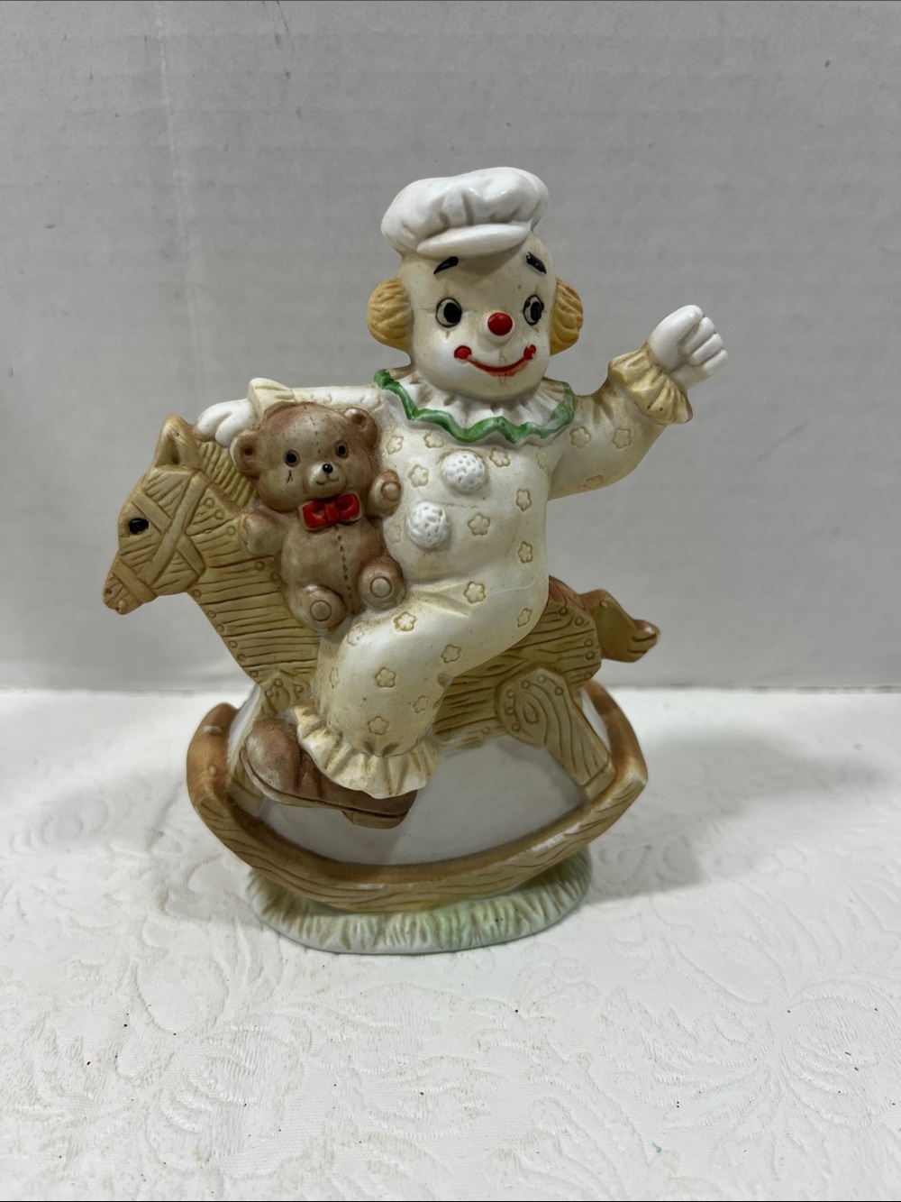 Hand-Painted Ceramic Child Clown on Rocking Horse Figurine